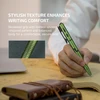 Hand holding green tactical pen with meteor-shower inspired grip, ensuring comfortable and secure writing.