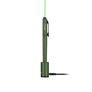 Green O Pen Glow laser pointer pen charging in its dock, emitting a bright green beam.