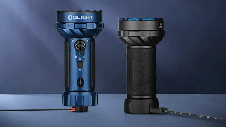 Olight blue and black tactical flashlights charging, showcasing durable design.