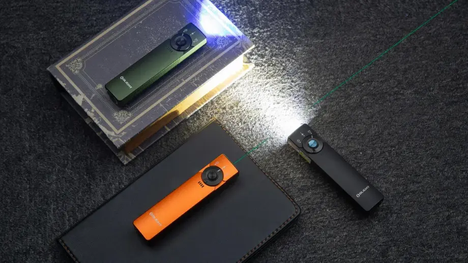 Green, orange, black Olight Arkfeld flashlights with laser pointers, casting light and green beams.