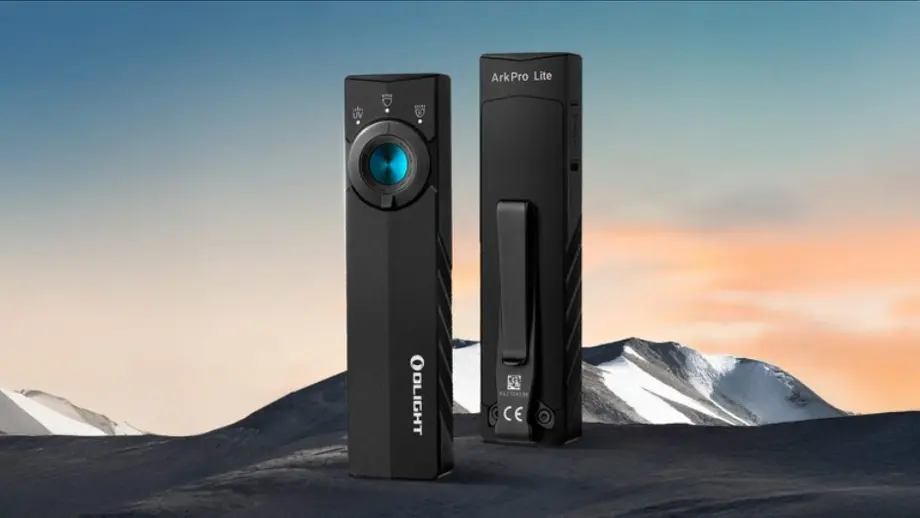 Black Olight ArkPro Lite flashlights, front and back, on a snowy mountain landscape.