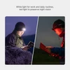 Olight Perun 3 Mini Headlamp on a person using white light for reading and red light for night vision outdoors.