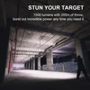 Man uses a powerful 1500 lumen flashlight with 205m throw in a dark underground concrete structure.