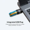 Olight flashlight with integrated USB plug charging in a laptop, convenient portable light.