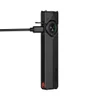 Black Olight Arkfeld EDC flashlight charging with USB-C cable on white background
