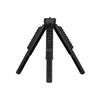 Black portable tabletop tripod for cameras and smartphones.