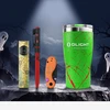 Olight Halloween EDC gear including green tumbler, orange pocket knife, red tactical pen, and textured flashlight.